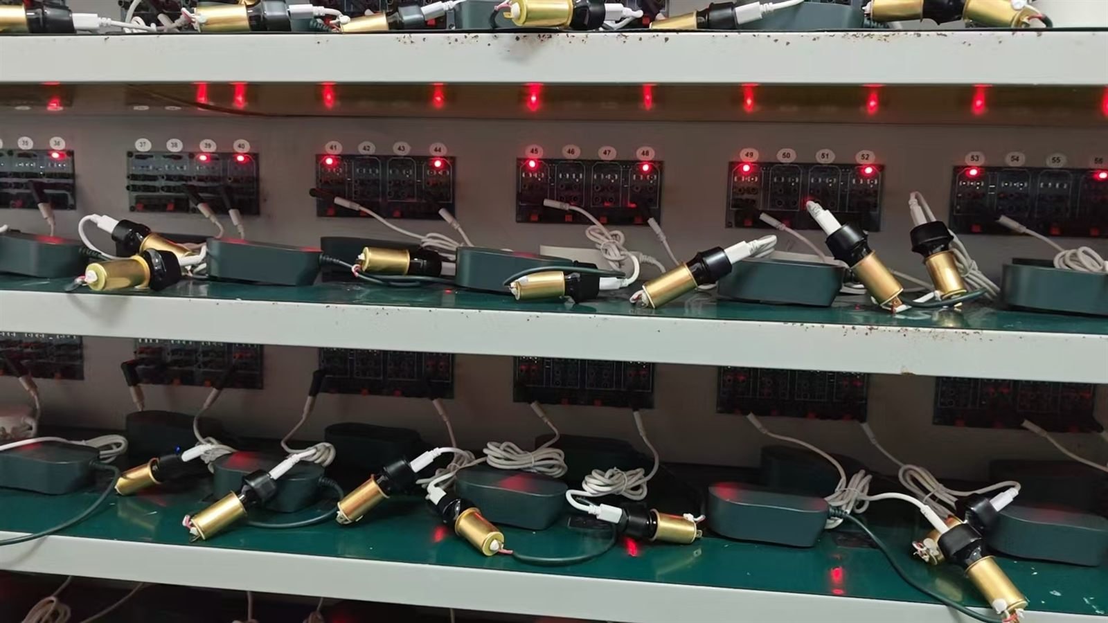 Car charger aging test rack during quality inspection