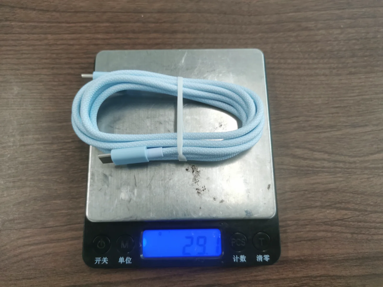 USB-C charging cable weight inspection during quality control